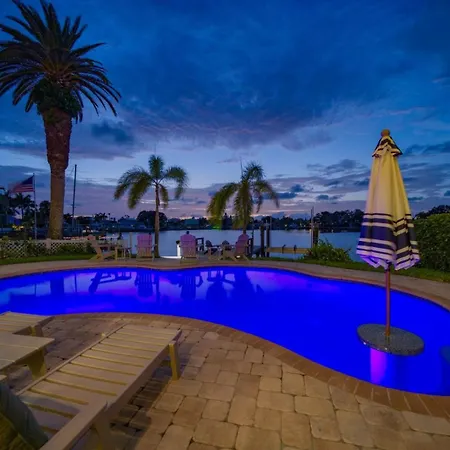 Waterfront Luxury W/ Heated Salt Pool & Golf Cart Villa