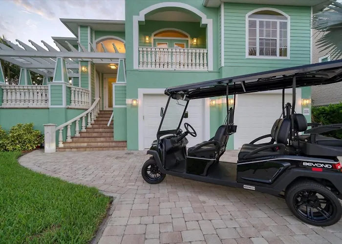 Waterfront Luxury W/ Heated Salt Pool & Golf Cart *