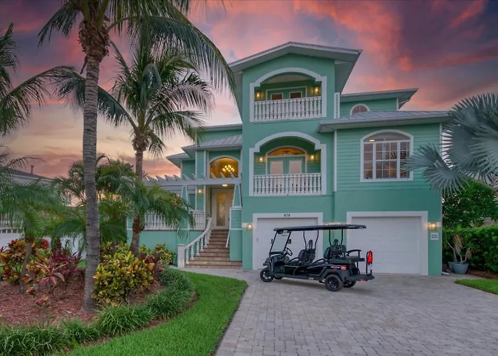 Waterfront Luxury W/ Heated Salt Pool & Golf Cart Holiday home
